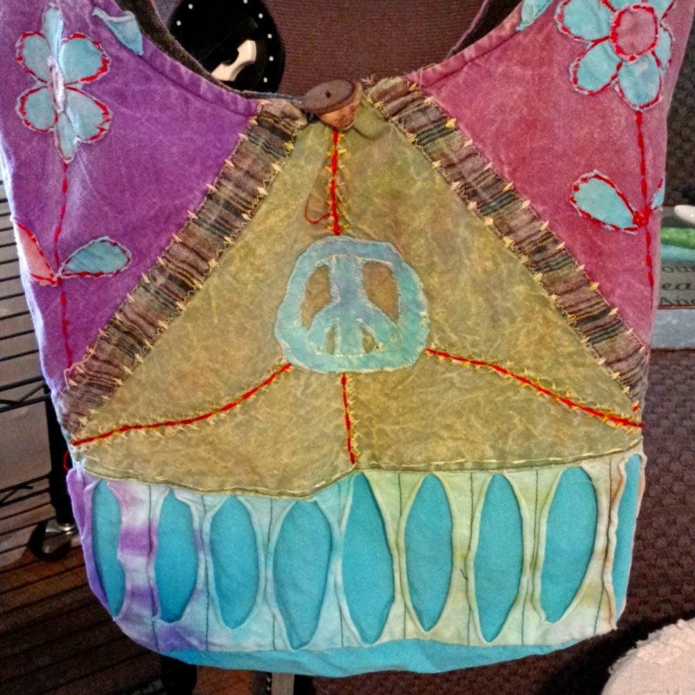 Cotton hobo bag made by Rising International with peace signs💙